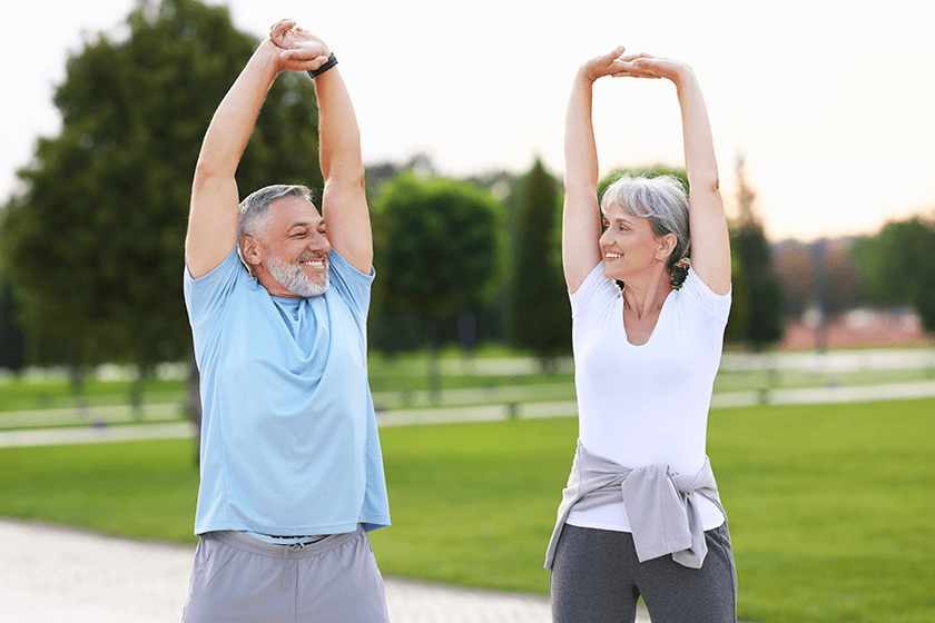 morning-exercises-happy-mature-married-couple