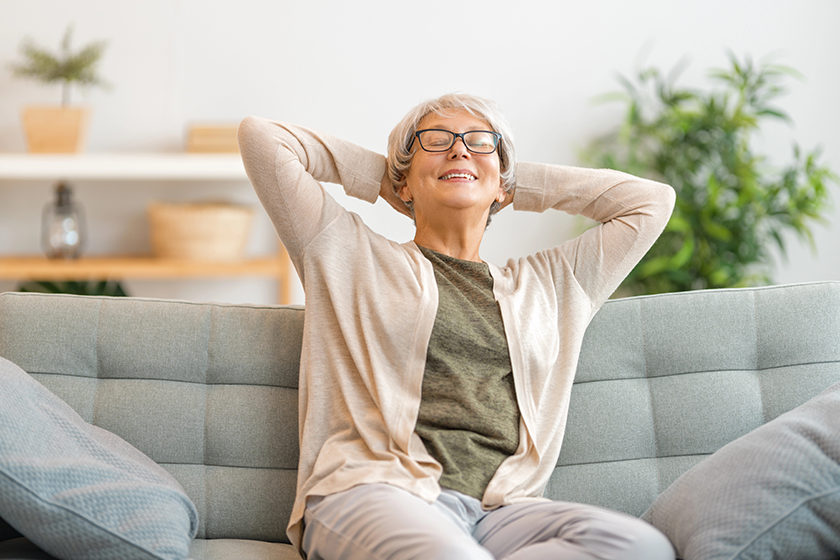 Senior woman sitting on the sofa