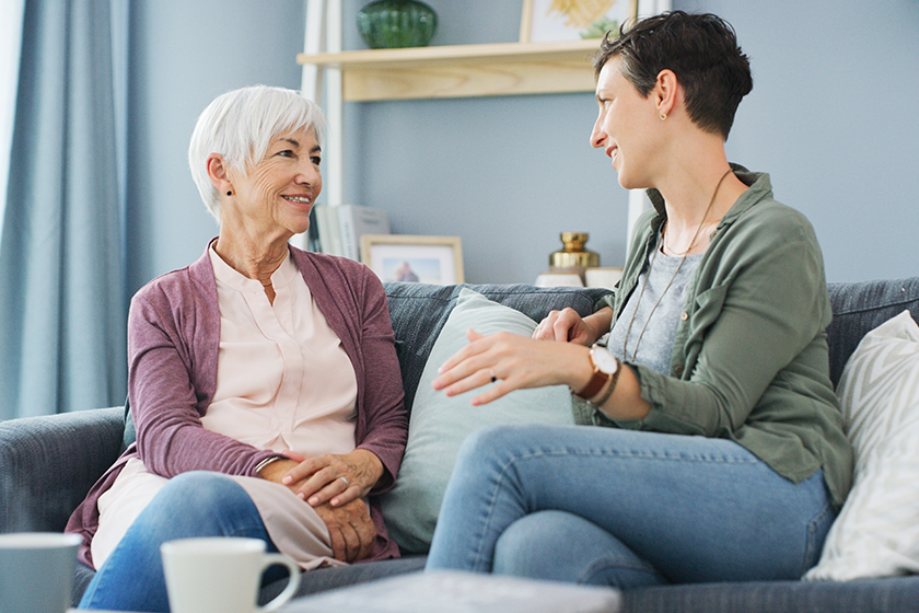 love-spending-time-mum-attractive-young-woman-sitting-sofa