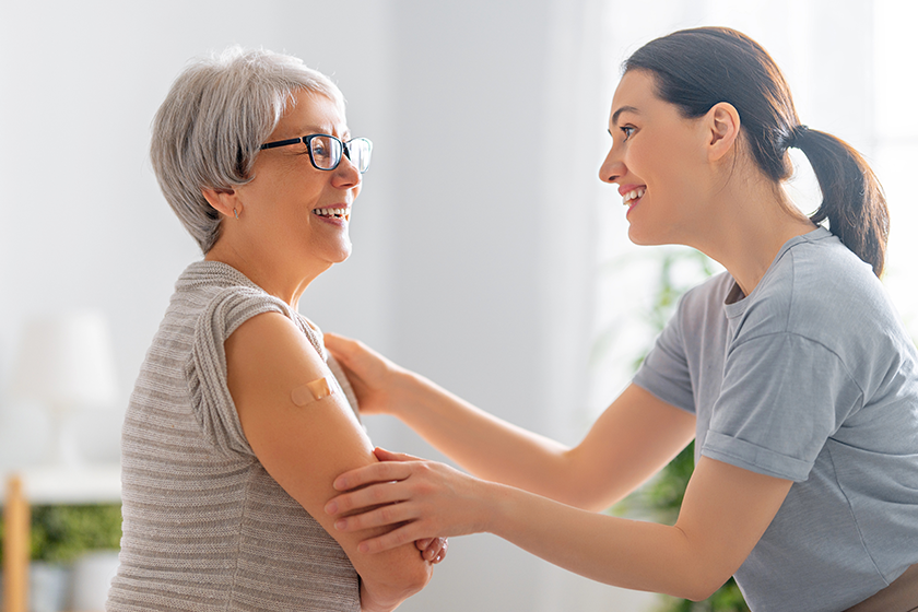 senior-woman-vaccination-her-adult-daughter